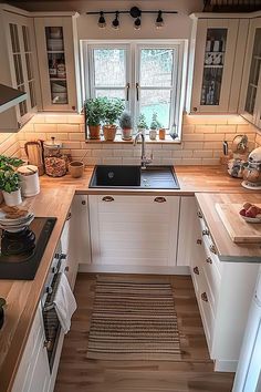 the kitchen is clean and ready for us to use in its new owner's home