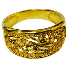 This is an 18K gold ring made in Turkey. It depicts a wide band with a pierced longitudinal center that is adorned with few scrolls of floral branches and some beads in line framed them. The ring is hallmarked AK, Turkey and 18K. Floral Branch, 18k Gold Ring, Wide Bands, Band Ring, Gold Ring, Band Rings, Gold Rings, 18k Gold, Jewelry Rings