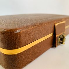 "A rustic vintage brown leather mens jewelry box with velvet inside. Great for traveling or make a statement while displaying on your dresser or bathroom counter. This piece has definite ware but still a very cool vintage piece. Measures - 7\" long X 4-1/4\" wide X 1-1/2\" deep. READY TO SHIP. Thank you for visiting The Freckled Berry! Be sure to check out other great items on my site. Vintage Treasures: http://www.etsy.com/shop/TheFreckledBerry?section_id=12639845 Games, Toys, Dolls: http://www Brown Rectangular Jewelry Storage As Gift, Brown Rectangular Case For Formal Occasions, Brown Rectangular Formal Case, Brown Formal Rectangular Case, Vintage Rectangular Case For Gifts, Vintage Rectangular Case For Gift, Vintage Rectangular Cases For Gifts, Brown Leather Jewelry, Army Men Toys