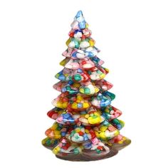 a glass christmas tree with candy in it