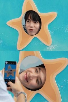 a woman taking a selfie in front of a starfish mirror with her cell phone