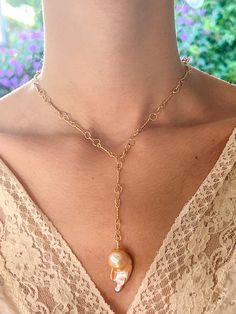 Peach Japanese Keshi Pearl Necklace on Gold Nautical Chain by Sage Machado - The Sage Lifestyle Handmade Elegant Pendant Chain Necklace, Elegant Handmade Pendant Chain Necklace, Yellow Gold Lariat Necklace With Pearl Pendant, Unique Single Strand Necklace For Formal Occasions, Unique Yellow Gold Necklaces For Weddings, Artisan Pearl Pendant Necklace, Handmade Gold Pearl Necklace With Briolette, Gold Single Strand Lariat Necklace, Artisan Gold Pendant Custom Necklace