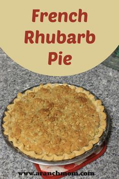 a pie with the words french rhubarb pie on top and below it