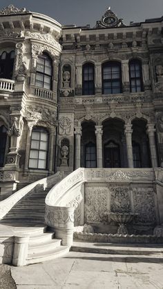 an ornate building with stairs leading up to it