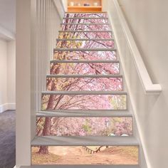 the stairs are painted with cherry blossom trees