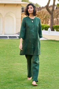 Green shirt tunic with contrast front buttons. Comes with coordinating pant. - Aza Fashions Workwear Pant Set With Long Set-in Sleeves, Spring Workwear Long Sleeve Palazzo Set, Workwear Straight Kurta With Set-in Sleeves, Green Buttoned Workwear Set, Green Buttoned Sets For Workwear, Green Long Sleeve Sets With Button Closure, Casual Straight Kurta For Work, Spring Palazzo Set For Work, Long Sleeve Linen Kurta For Work