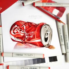 a drawing of a can of coca - cola with crayons next to it