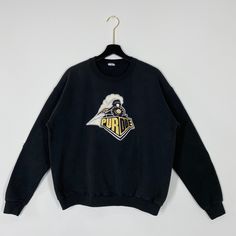 Vintage 90s Purdue University Sweatshirt Purdue Crewneck Purdue Boilermakers Sweater Pullover Purdue Boilermakers Embroidered Logo Medium Brand Name :- Purdue University Tag Size :- Fits Medium Manual Measurement :- WIDTH (armpit to armpit) :- 24 inches / 61cm LENGTH (shoulder to end of garment) :- 25 inches / 64cm Condition :- Used Good Condition 8/10. No Hole, No Stain. Tag Missing.                     - Colors Might Be Different Due To Lighting. DHL EXPRESS = 3-6 business day arrived **WE NOT 90s Style Crew Neck Sweatshirt With Embroidered Graphics, 90s Style Winter Sweatshirt With Embroidered Graphics, Vintage Crew Sweater With Embroidered Logo, Vintage Embroidered Sweatshirt For Streetwear, 90s Embroidered Long Sleeve Sweatshirt, 90s Embroidered Top For Streetwear, Vintage Crew Neck Sweater With Embroidered Graphics, Vintage Embroidered Crew Neck Sweater, Vintage Crew Sweatshirt With Embroidery