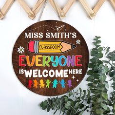 a wooden sign that says, miss smith's classroom everyone is welcome here