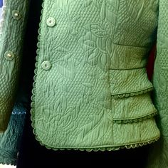 "This classic and timeless snap-buttoned blazer in green is tailored in fitted style with scalloped lace trimming on sleeves, hemline and collar. Long sleeve design with crop bracelet length trimming and 2-row wide trimmed side panels on both sides of underarm adding a style to it. The material is comfortable, slightly stretchy, quilted, with texture. Size: Petite 6 (P) 59% Polyester 41% Cotton Classic and timeless Color: vibrant green Quilted floral embossed pattern Stiff Fuzzy Lace Style Trim Fitted Green Blazer With Buttons, Green Fitted Blazer With Buttons, Elegant Fitted Green Outerwear, Elegant Green Fitted Outerwear, Fitted Green Blazer With Button Closure, Fitted Green Outerwear With Button Closure, Women Office Attire, Business Women Office, Evening Suit