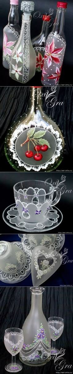 three different glass dishes with red flowers on them and one has a wine bottle in the middle