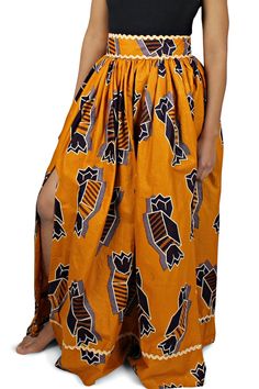 Brown Maxi Dress With Side Slits, Printed Maxi Length Flowy Skirt, Printed Flowy Maxi Skirt, Long Maxi Skirt With Side Slits, Flowy Maxi Skirt With Side Slits, Long Skirt With Side Slits, Relaxed Orange Maxi Skirt, Printed Relaxed Fit Maxi Skirt, Brown Full-length Maxi Skirt