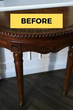 a wooden table with a yellow sign on it that says, before and after restoration