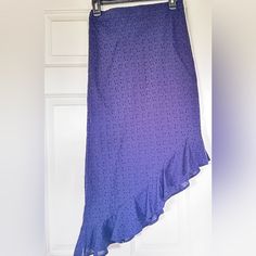 Brand New With Tags, Gorgeous Midi Skirt In Size Xs. It Looks Great Paired With Boots Or High Heels. Dark Navy Color, Photo Looks Bright But It’s A True Navy Color. Blue Asymmetrical Hem Skirt With Relaxed Fit, Blue Asymmetrical Flowy Wrap Skirt, Asymmetrical Blue Skirt For Summer, Fitted Blue Asymmetrical Wrap Skirt, Chic Blue High-low Hem Skirt, Blue Asymmetrical Denim Skirt, Blue Fitted Skirt With Asymmetrical Hem, Blue Asymmetrical Hem Flowy Skirt, Ruffle Midi Skirt