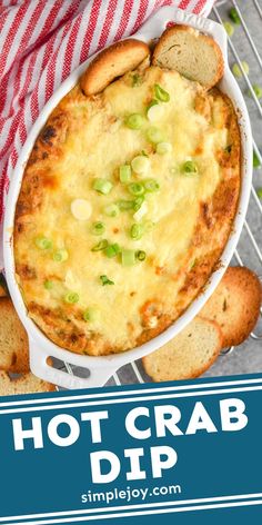 a casserole dish with bread and green onions in it on a wire rack