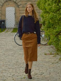 The Randers Pencil Corduroy Skirt is a versatile piece that combines classic corduroy material with a modern design. It features the semi low-rise H-line skirt made of sturdy corduroy material.- Medium length for slim body coverage- Side pockets and back pockets- Completed with contrasting detail inside the waistband for a polished look* The actual color of the product is the most similar to the product cut.