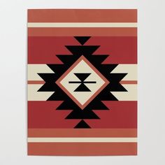 a red and black rug with an abstract design in the middle, on top of a white wall