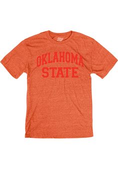 Support your Oklahoma State Cowboys in this Orange Short Sleeve Fashion Tee! This Arch Team Name Fashion T Shirt features a screen print of arched team name across chest. Be ready to shout "Go Pokes" when you wear this OSU Short Sleeve Fashion T Shirt in the stadium or on the street. Short sleeve, Cover seam stitched rib knit collar, Double needle stitched sleeves and bottom hem, Unisex, Screen print team graphic, 50% Polyester/ 37% Cotton/ 13% Rayon Sporty T-shirt With Embroidered Graphics For Game Day, Team Spirit T-shirt With Embroidered Graphics For Game Day, College Crew Neck T-shirt With Letter Print, Casual T-shirt For Game Day In Spring, Varsity T-shirt With Embroidered Graphics For Fall, Cotton Varsity T-shirt With Lettering, Casual Crew Neck T-shirt For Football Season, Collegiate T-shirt With Lettering For College, Spring Cotton Varsity T-shirt