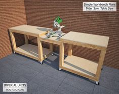 a workbench with a table saw on it in front of a brick wall