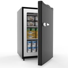 an open refrigerator filled with lots of food and drink cans on the inside, while it's door is open