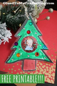 a christmas tree card with the words free printable on it and an image of a baby