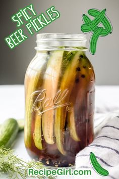 pickles in a jar with the words spicy beer fikes