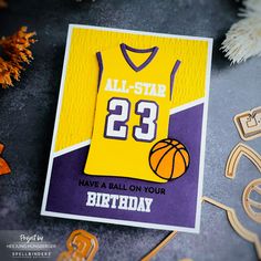 an all - star birthday card with a basketball jersey on it, surrounded by decorations