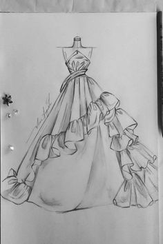 a drawing of a dress with ruffles on the skirt and neckline is shown