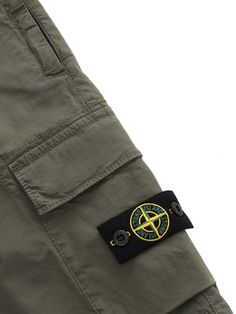 Military green Bermuda shorts in stretch cotton with patch pockets on the sides and contrasting logo label.Composition: 97% COTTON 3% ELASTANE Outdoor Green Shorts With Patch Pockets, Green Outdoor Shorts With Patch Pockets, Casual Green Cargo Shorts With Patch Pockets, Green Cotton Cargo Shorts With Patch Pockets, Stone Island Kids, Stone Island Junior, Boys Bottoms, Kenzo Kids, Saint Laurent Shoes