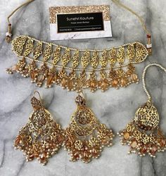 Champagne color beading on gold finishing Gold Necklaces With Stone Work For Party, Gold Beaded Party Jewelry, Traditional Embellished Wedding Necklaces, Brown Gold Beads Jewelry For Party, Festive Gold Embellished Jewelry, Gold Bollywood Jewelry For Party, Bollywood Style Gold Jewelry For Party, Gold Jeweled Bollywood Necklace, Bohemian Gold Embellished Necklace