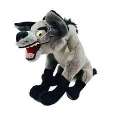 a stuffed animal with its mouth open and it's tongue out