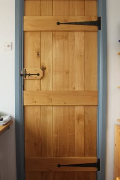 an open wooden door in a room