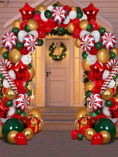 an arch decorated with christmas balloons and candy canes