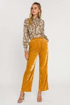 These Velvet Wide Leg Pants are perfect for a night out! The high waisted cut and pleat detail at front keep you feeling secure and stylish. The wide leg silhouette and faux welt pockets make sure that you'll always look on trend. Get the perfect blend of sophistication and comfort with our high-quality velvet pants. High-waisted Wide-leg silhouette Pleat detail at front Faux welt pockets Hidden button and hook-and-bar with zip fly Hand wash cold Do not bleach Do not tumble dry Iron low Shell: 97% Polyester 3% Spandex JL736P Total length: 42" Waist: 26.5" Inseam: 30" Velvet Wide Leg Pants, Jumpsuit Fall, Knitwear Trends, Knit Loungewear, Rose Velvet, Strapless Bodycon Dress, Gold Velvet, Fall Dress, Velvet Pants