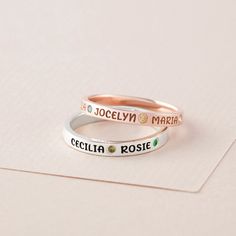 Customed with kids' names and birthstones, this ring is a meaningful present for mom or grandma on any occasion. P R O D U C T ∙ I N F O * Material: Solid 925 Sterling Silver * Finishing: Silver - Gold - Rose Gold * Ring's band is 1/8'' (2.8 mm)  * By default, silver items comes with BLACK engraving and gold-plated item comes with CLEAR engraving. H O W * T O * O R D E R 1. Select your preferred COLOR, NUMBER OF BIRTHSTONES and RING SIZE from the menu. 2. Let us know the KIDS' NAMES and BIRTHSTO Mother's Day Stackable Sterling Silver Birthstone Ring, Mother's Day Sterling Silver Stackable Birthstone Ring, Stackable Sterling Silver Birthstone Ring For Mother's Day, Mother's Day Adjustable Sterling Silver Birthstone Ring, Personalized White Birthstone Ring For Anniversary, Silver Birthstone Ring With Names In Sterling Silver, Adjustable Sterling Silver Birthstone Ring For Mother's Day, Silver Sterling Birthstone Ring With Names, Personalized Rose Gold Engraved Ring