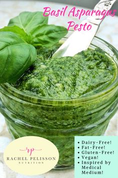 basil asparagus pesto in a jar with a knife on top and the recipe below