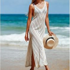 Swimsuit Cover Up Casual Sheer Long Dress Beige/Cream One Size Going to a vacation beach resort or spending the day on the local beach, stay comfortable and cool in this casual sheer long dress cover up.  Made from soft polyester, this cover up dress is quick drying and soft on your skin. The sheer design complements swimwear on the beach and in the cabana. Visit our store to explore the entire collection. Whether you're sipping cocktails at a beachfront bar, lounging in the cabana, or dancing under the stars, our cover-ups will keep you effortlessly chic. Fins West...Confident and Complete Beachy V-neck Beach Dress For Vacation, Summer V-neck Sundress For Vacation, Summer V-neck Beach Dress, Casual Dresses For Beach Party During Resort Season, V-neck Sundress For Beach Party Vacation, Beachy V-neck Maxi Dress For Beach, V-neck Sundress Style Cover-up For Beach Party, Beige V-neck Beach Dress For Vacation, Casual V-neck Swimwear For Beach