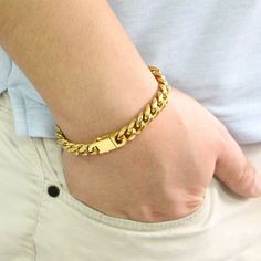 Miami Cuban Bracelet Gold is coated with 14k gold which makes it a perfect addition to anyone's bracelet collection. You can layer multiple bracelets for a cool look that enhances the style of your casual and formal outfits. This bracelet is comfortable to wear on a daily basis and has a metal clasp making for an easy getting on/off. You can get this piece as a perfect present for your homie on a special occasion or as a surprise gift. We know you’ll never want to take your Caligio bracelets off Modern Gold-plated Gold Bracelet, Gold Stainless Steel Bangle Bracelet, Everyday Gold-plated Stainless Steel Bracelet, Everyday Gold-colored Stainless Steel Bracelet, Adjustable Gold Chain Bracelet With Gold Clasp, Everyday Metal Bracelets With Gold Clasp, Modern Gold Chain Bracelet With Gold Clasp, Gold Jubilee Cuff Bracelet For Everyday, Gold Jubilee Bracelet For Everyday Wear