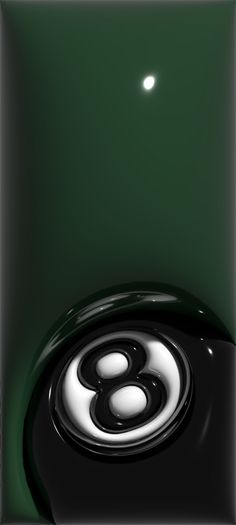 a black and white object with a green background