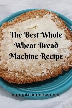 the best whole wheat bread machine recipe on a blue plate with text overlay that reads, the best whole wheat bread machine recipe