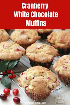 cranberry white chocolate muffins on a cooling rack