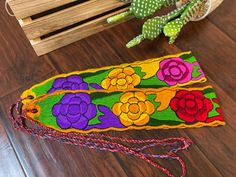 "Floral embroidered Mexican belt. One size fits all. Dimensions: Length- Belt is about 37\". Ties are 22\", about 81\" altogether. Width- 4\" * Pieces are uniquely made and colors may vary Shop out Mexican tops 👇🏻 https://www.etsy.com/shop/Chimismx?section_id=31853328" Festival Fabric Belt With Multicolor Embroidery, Multicolor Embroidered Fabric Belt For Festival, Festival Multicolor Embroidery Fabric Belt, Adjustable Embroidered Multicolor Belts, Adjustable Multicolor Embroidered Belts, Traditional Adjustable Embroidered Belts, Mexican Belts, Mexican Tops, Mexican Belt