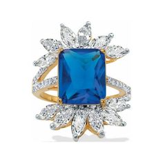 This true blue beauty gives you a luxe look for a charming price. Set with a large vibrant simulated blue sapphire emerald-cut center stone that's flanked by white marquise-cut cubic zirconia accents, the split shank design adds dimension and flair. 9.45 carats T.W. Richly plated in 14k yellow gold. Sizes 6-10. 60183RNG Size: 8.  Gender: female.  Age Group: adult. Halo Wedding Rings Sets, Starburst Ring, Sapphire Halo Ring, Heart Wedding Rings, White Sapphire Engagement Ring, Blue Beauty, Sapphire Solitaire, Wedding Rings Halo, Gold Cocktail Ring