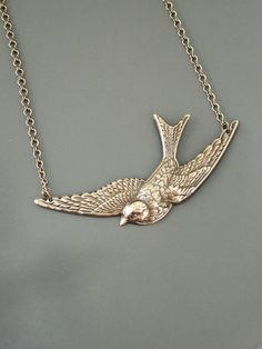 "Vintage Jewelry - Vintage Brass Necklace - Vintage Necklace - Bird Necklace - Statement Jewelry - Bird Jewelry - Chloe's Vintage handmade This is an awesome vintage piece! Gorgeous flying bird. Remarkable detail with a rich patina. Chloe says, \"Wear it and feel fabulous!\" The pendant measures 3 1/4\" wide. You can choose the necklace length you would like at check out. I measure just the length of the chain not including the pendant. So, 20\" chain has a 20\" drop. Thanks for visiting Chloe's Handmade Bird-shaped Jewelry For Gifts, Handmade Bird-shaped Jewelry Gift, Handmade Bird-shaped Necklace For Gift, Bainbridge Island, Flying Bird, Bird Necklace, Bird Jewelry, Brass Necklace, Necklace Statement