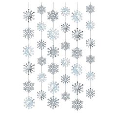 snowflakes hanging from strings on a white background