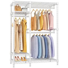 a white rack with clothes and shoes hanging on the rails, in front of a white background