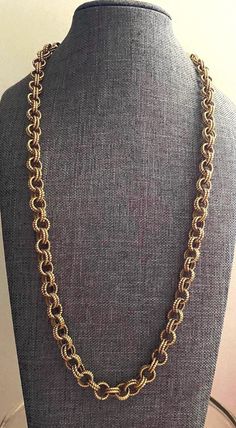 Length is 24 inches unclasped.  Gold-tone metal alloy link chain. I believe it's age is circa 1988 (my estimation). Most jewelry makers offered a similar necklace with this chainmail style. Genuine Monet Jewelry with classic styling--a lovely fashion accessory.  Excellent pre-owned-used condition. The clasp works well.  Please review the photos as they are part of the condition and design assessment.  Be certain to view my other current Monet listings. Questions always welcome.  Free USPS ground advantage insured domestic shipping to the lower 48 states, new mailer box. Lovely Fashion, Mailer Box, Monet Jewelry, Vintage Monet, Louisville Ky, Jewelry Maker, Mid Century Style, Gold Tone Metal, Link Chain