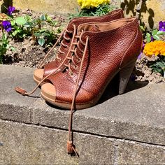 Lucky Brand Blue Jeans America Francisca Leather Open Toe Booties. Heel Height Is Approximately 4 1/2 Inches; Platform 1 Inch. Leather Upper, Man-Made Lining + Sole. There Are One Irregularities In The Leather. I Provided A Picture But Just Contact Me & I Can Provide More. Made In China. Great Condition. Never Worn; I Really Just Tried Them On And Took Them Home. Please See Photos. Brown Leather Summer Booties, Spring Leather Booties With 4-inch Heel, Brown Ankle Boot Heels With 4-inch Heel, Brown Ankle Boots With 4-inch Heel, Brown 4-inch Heel Ankle Boots, Brown Ankle Boot Heels For Spring, Leather High Heels, Lucky Brand Shoes, Brand Shoes