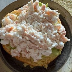 there is a sandwich with shrimp on it