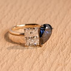 an engagement ring with a square cut diamond